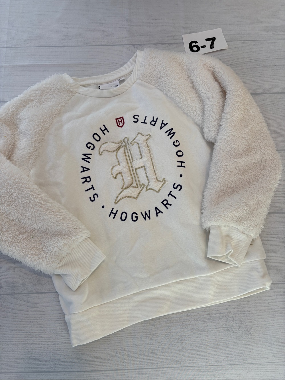 Warner Bros. Cream Hogwarts Sweater